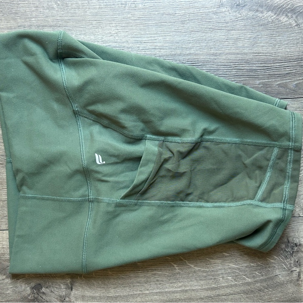 Fabletics Olive High-Rise Pocketed Bike Shorts - Picture 2 of 5